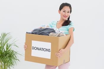 Volunteering stopping a box of donations as a result of not-for-profit improved donor relationship.